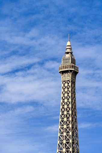 Las Vegas, Nevada, USA - February 2019:  Replica of the Eiffel Tower against a blue sky at the Paris Resort Hotel on Las Vegas boulevard, which is also known as the Las Vegas strip.