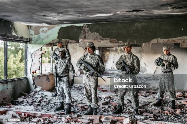 Soldier Squad Team Portrait In Urban Environment Stock Photo - Download Image Now - Military, Portrait, Rebellion