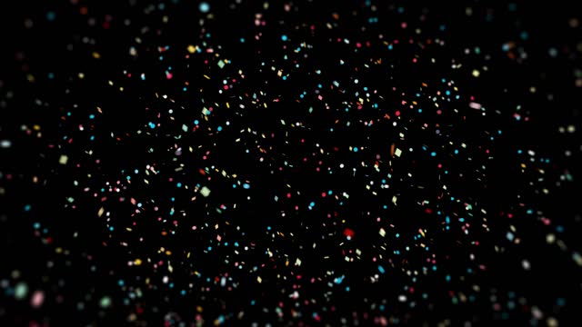Colorful сonfetti explosion on a black backgrounds. alpha channel included