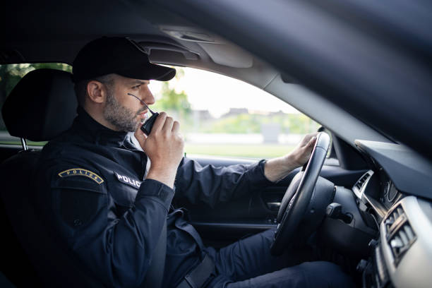 istock Middle aged Caucasian male police officer at work 1321017480