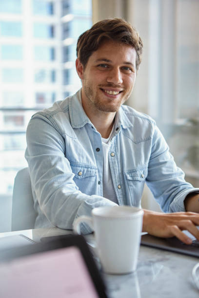 istock Portrait of freelance worker using laptop while having breakfast in the morning 1321017788