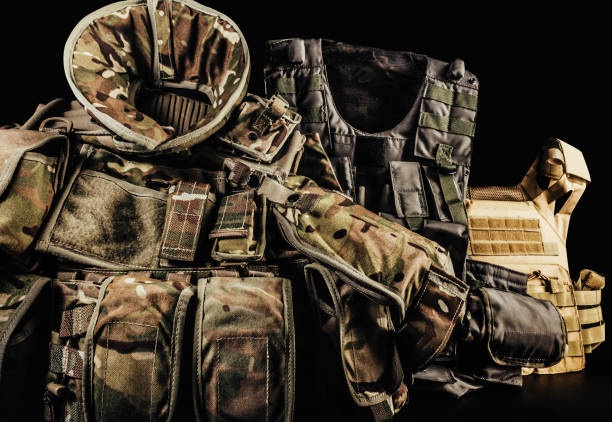 istock Various types of soldier camouflaged armored vests. 1321017789