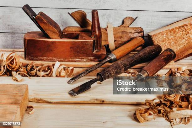 Old Fashioned Planes With Carving Chisels Laying On Workbench Table Stock Photo - Download Image Now