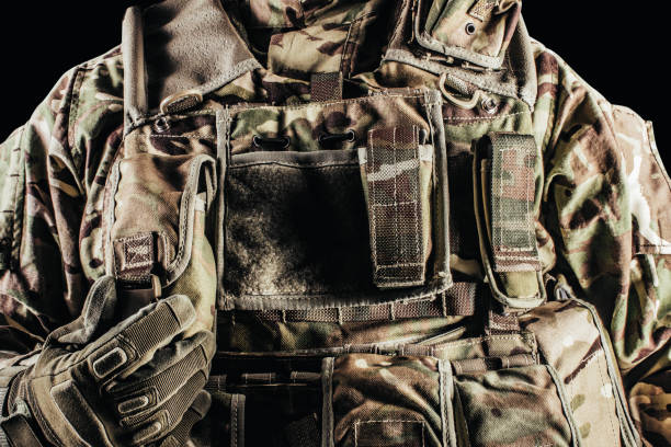 istock Soldier in level 3 camouflaged armored vest. 1321018028