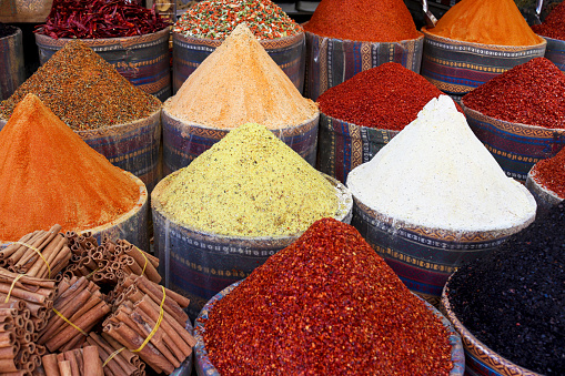 Oriental spice market in Istanbul, Turkey. Various spices on the counter. Selective focus.