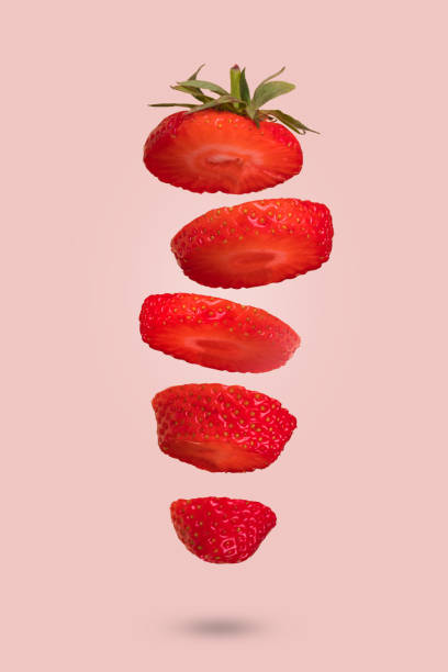 istock Floating levitating ripe strawbery on a pink background. Vitamins, healthy food concept. 1321023949