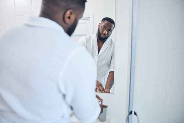istock Attentive bearded male person washing his hands 1321027074