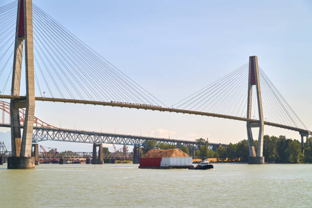 istock Tugboat and Barge New Westminster BC 1321037276