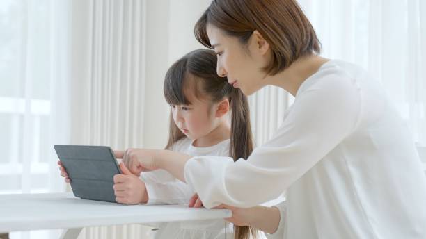 istock young asian mother and daughter 1321038324
