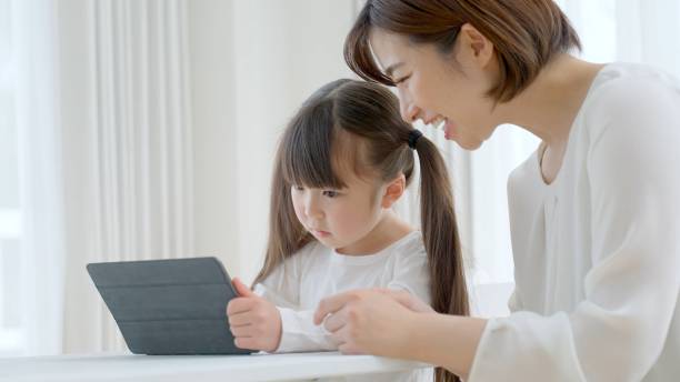 istock young asian mother and daughter 1321038351