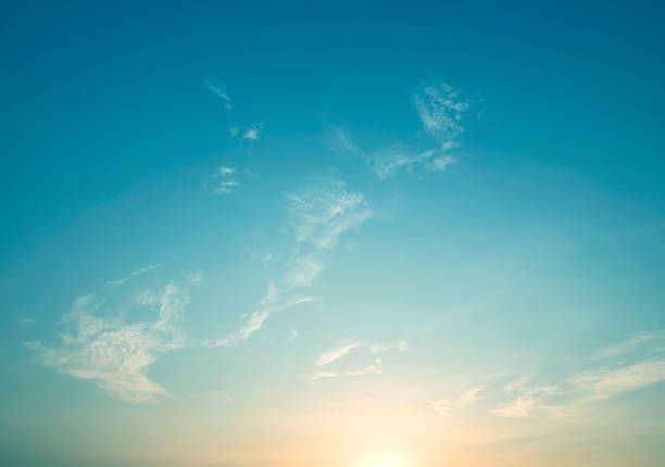 istock white fluffy clouds in the blue sky nature abstract sun 1321039115