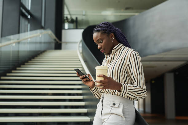 istock Young Businesswoman in Office Lobby 1321041749