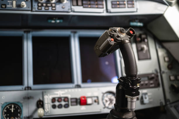 Airplane control stick. The cockpit of a jet aircraft.