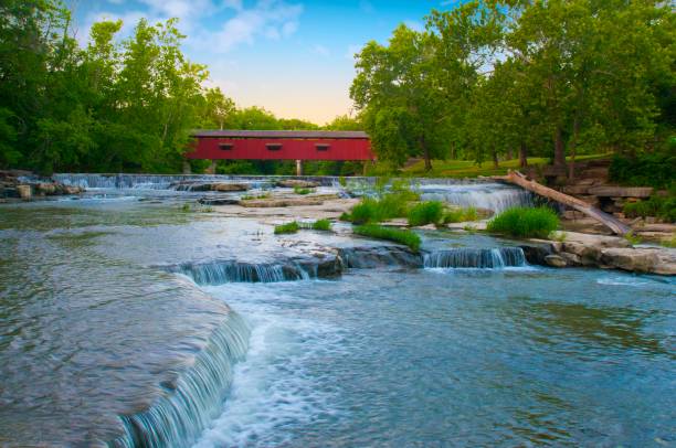 istock Waterfall-Cataract Falls-with covered bridge- On Mill Creek-Owen County Indiana 1321051740