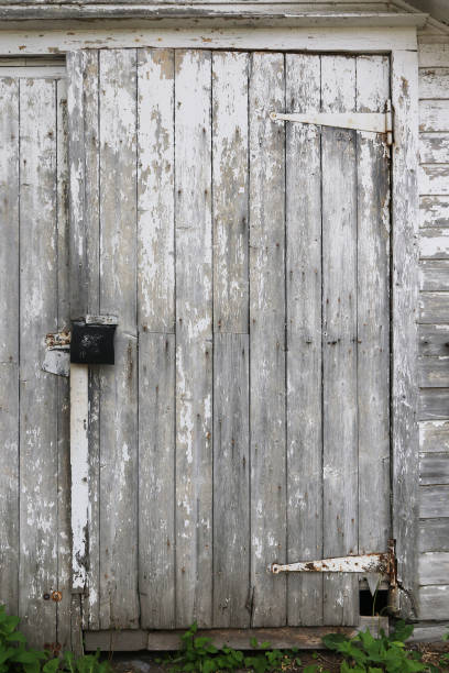 istock Weathered Shed Door Outdoors 1321054867