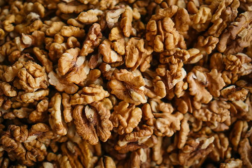 group of peeled Walnuts on table