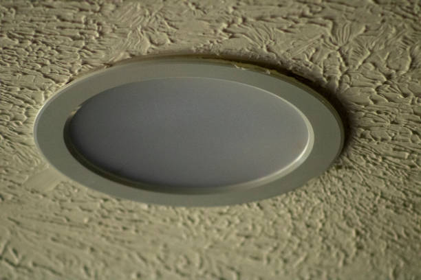 Recessed light mounted in sheetrock stock photo