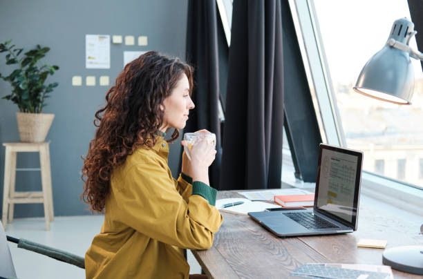 istock Woman working at home 1321057503