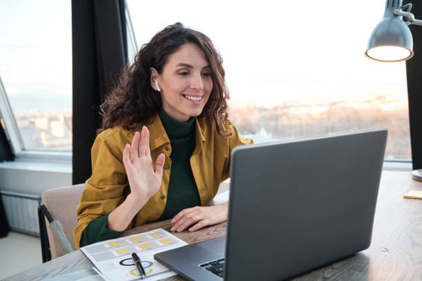 istock Woman talking online on laptop 1321058039