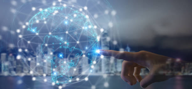 istock business man point hand to communication network wireframe mesh connected to data around world with distributed cloud system to make anywhere operations and collect internet of behaviors by using 5g 1321058233