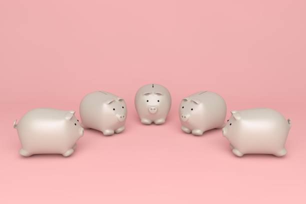 istock White piggy bank on pink background 1321063913