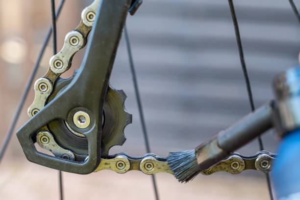 istock Cleaning a bicycle chain and oiling the chain for durability 1321067134