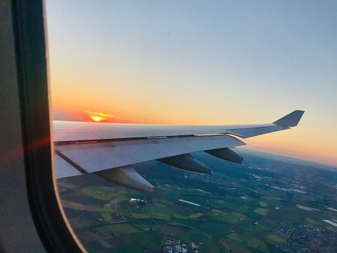 A beautiful sunrise captured from an airplane window close by Frankfurt airport in Germany