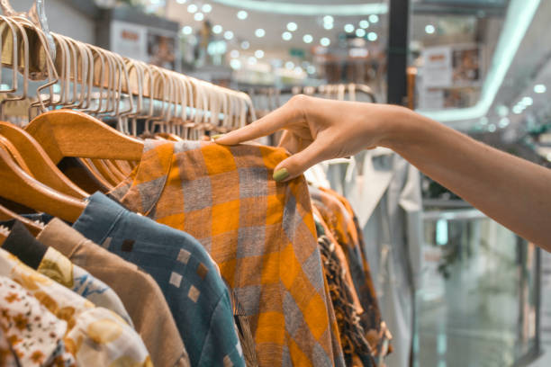 istock Hand shopping choose the clothing 1321071276