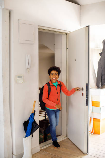 istock Excited Children Returning Home From School 1321072523