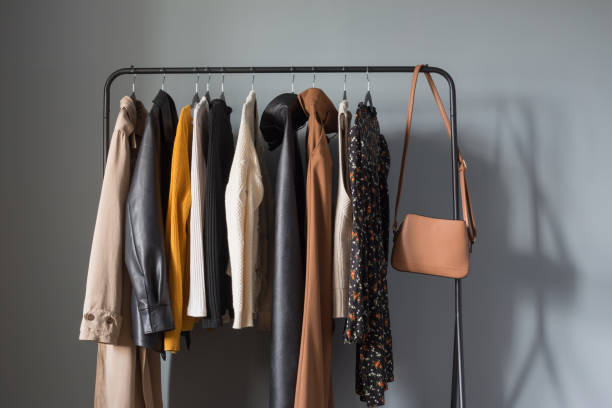 istock basic women's autumn wardrobe with shoes and handbags on  hanger 1321074447