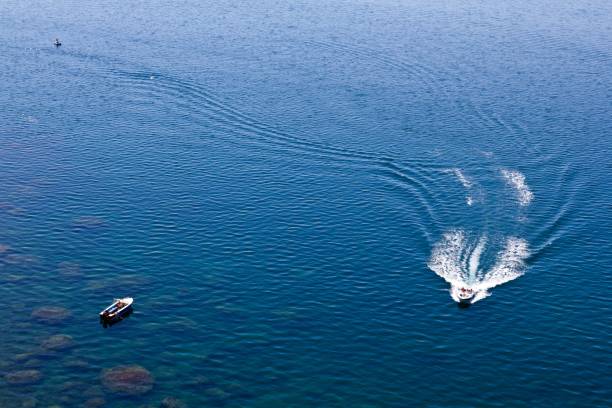 istock riding boat on a sea 1321074725
