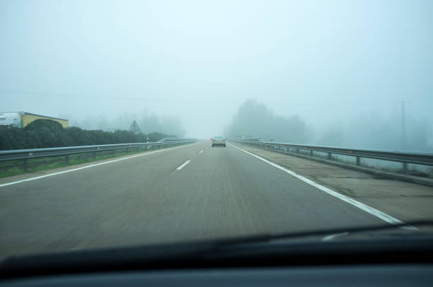 istock Crossing Guadiana river bridge under dense fog 1321078323