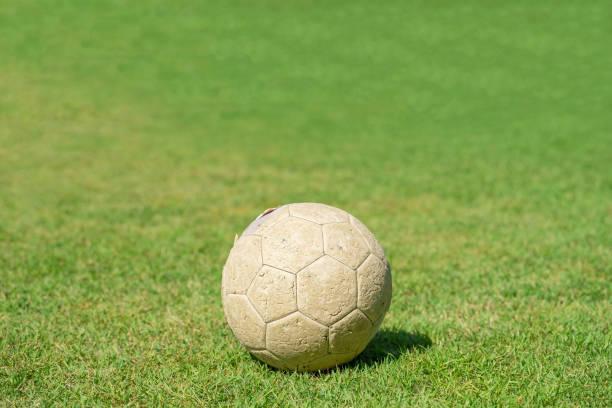 istock Soccer ball on green grass. 1321079833