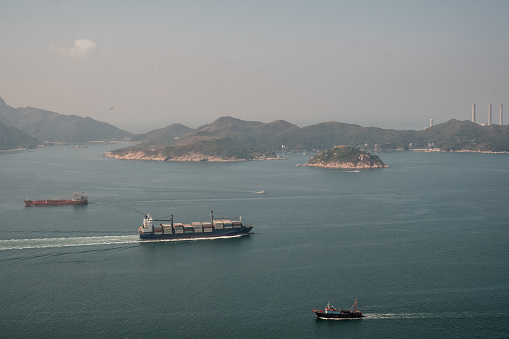 Hong Kong is the gateway of China to the world. Most of the cargo ships pass along the East Lamma channel opposite the southern part of Hong Kong island. At times, the navigation gets very heavy.