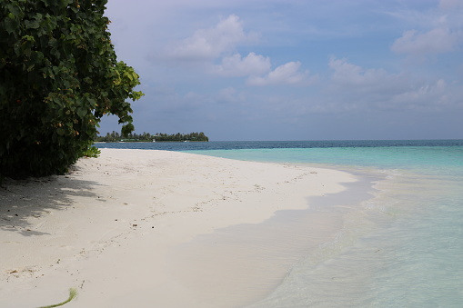 White sand and turquoise blue sea on the dream island of Rangali.