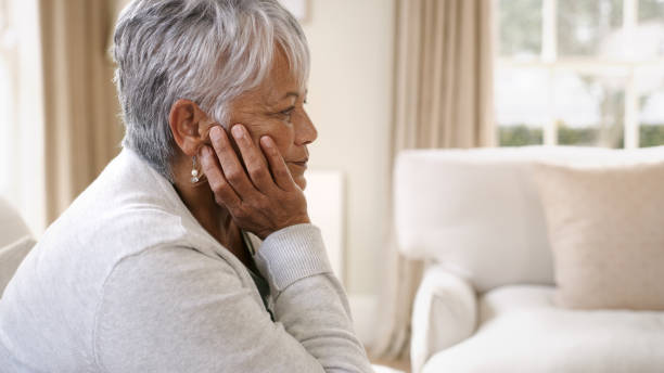 istock Shot of an elderly woman looking sad 1321083334
