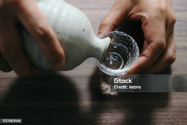 Middleaged Man Drinking Alcohol By Myself Stock Photo - Download Image Now - Saki, Happiness, Japan