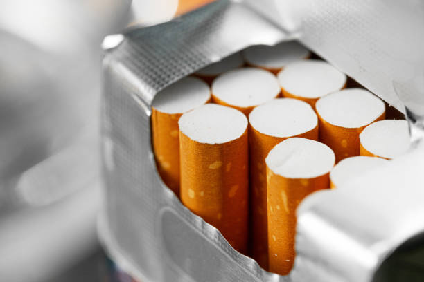 Opened new pack of cigarettes close up stock photo