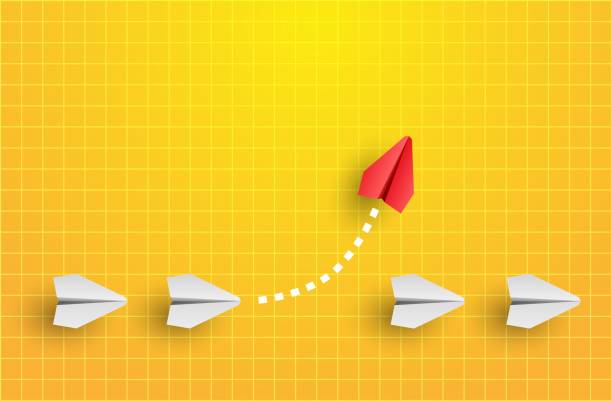 istock Individuality concept. Individual and unique leader red paper plane flies to the side. Think different 1321085925