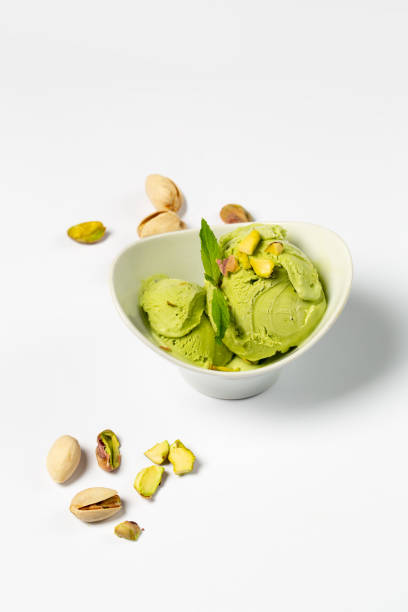 istock Pistachio ice-cream in bowl in studio 1321091464