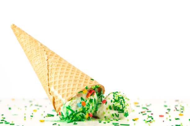 istock White ice-cream with sprinkles in waffle cone 1321091729