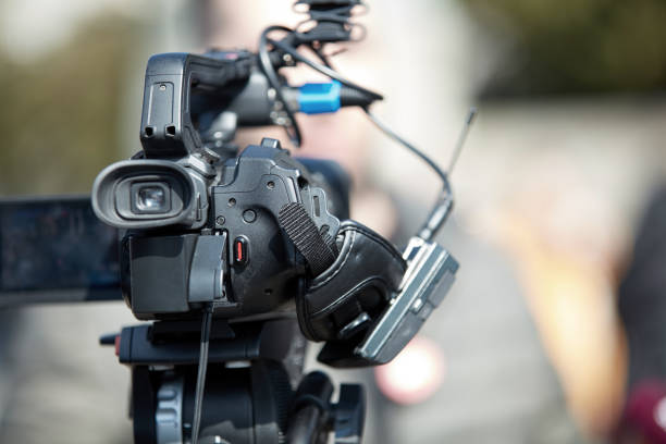 istock News broadcasting and recording protest on the streets. 1321091896