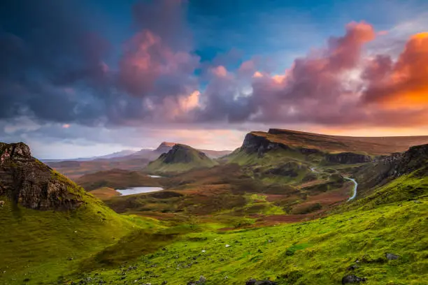 Moody sunset clouds over the Quiraing on the Isle of Skye in Scotland. The Quiraing is located at the north-east of the island.
