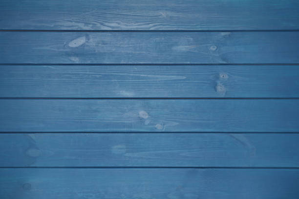 istock Texture of blue wooden surface as background, top view 1321100253