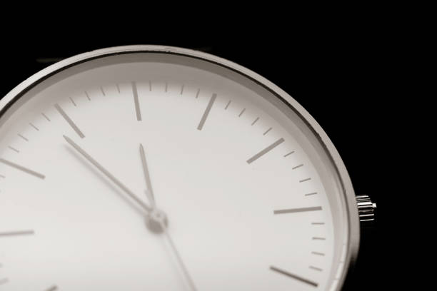 istock unbranded white analog wristwatch with black hands 1321100915