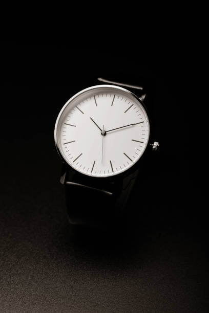 istock unbranded white analog wristwatch with black hands 1321100916