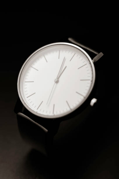istock unbranded white analog wristwatch with black hands 1321100920