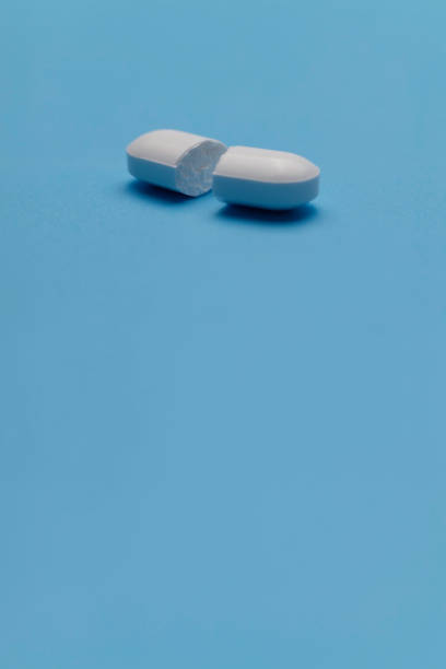 istock painkiller pills on a blue background 1321101424