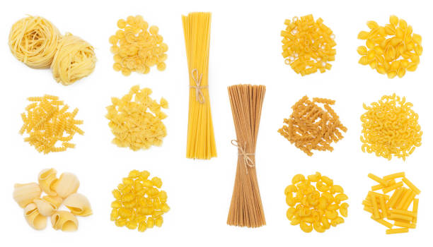 istock Various type of pasta isolated on black 1321105234