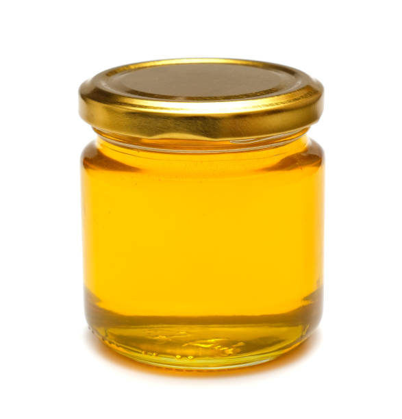 istock honey in glass jar 1321105590